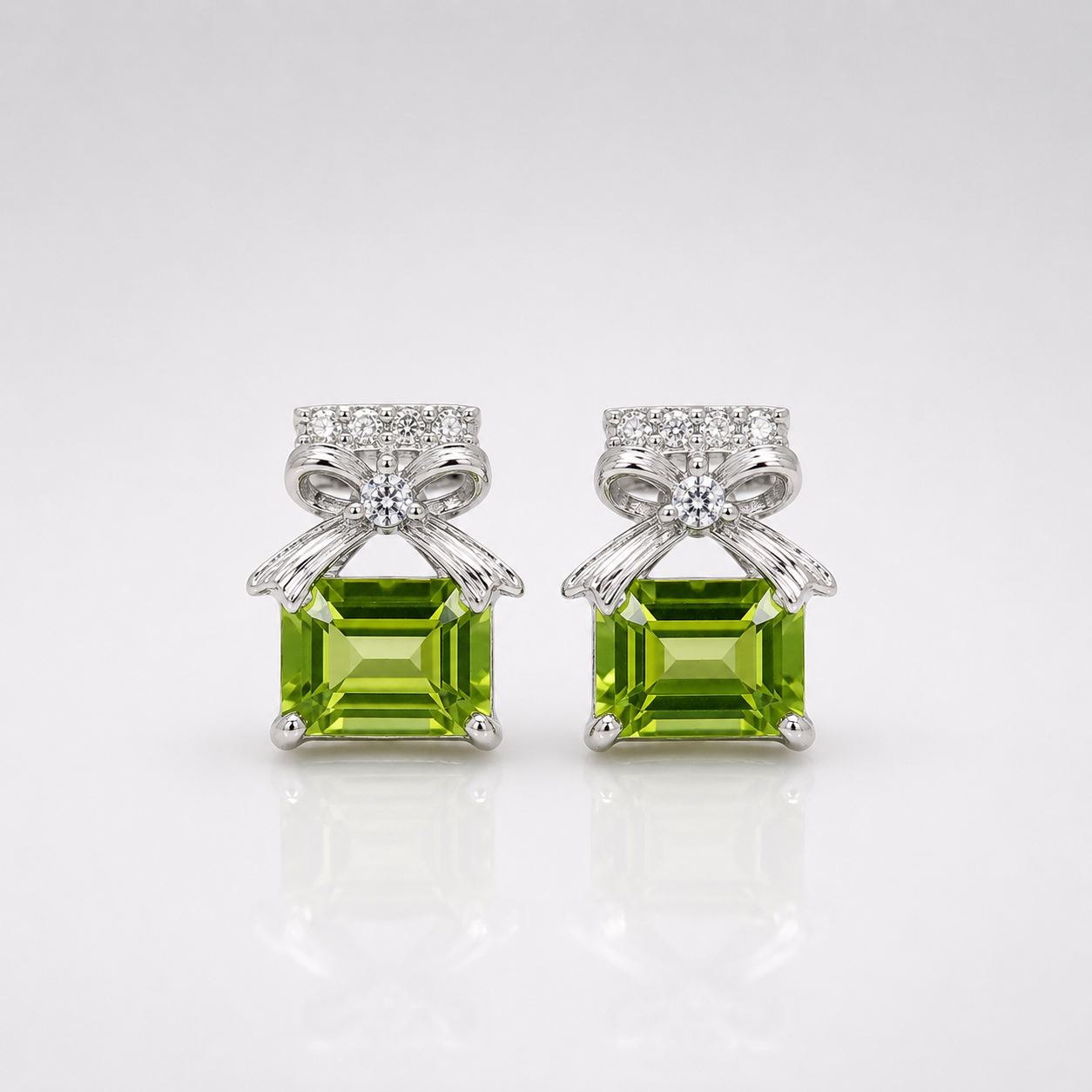 Peridot_Bow_Stud_Gemstone_Earrings.png Peridot Bow Stud Gemstone Earrings - Image 1